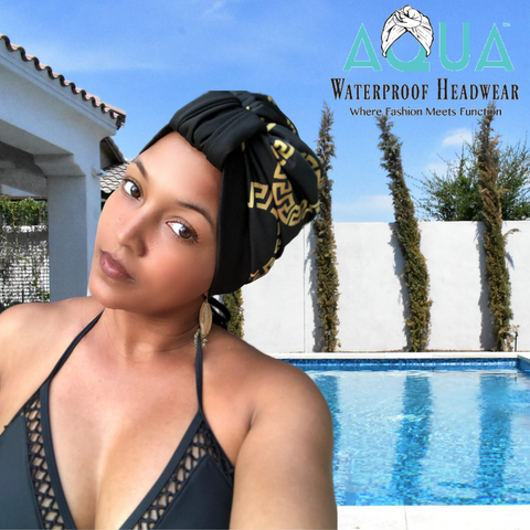 African American woman at the swimming pool wearing an AQUA Waterproof Turban, Luxe Banded Baller Rings print waterproof turban.