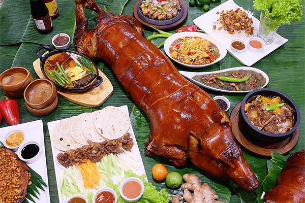 Christmas dinner in The Philippines with Lechon | Love to Sing