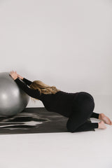 Pregnancy glute stretch with ball