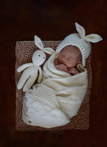 Baby with blanket and bunny from Unsplash