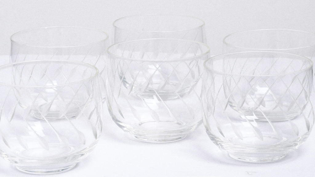 Six vintage Kiriko cut guinomi sake glasses on show at NiMi Projects UK.