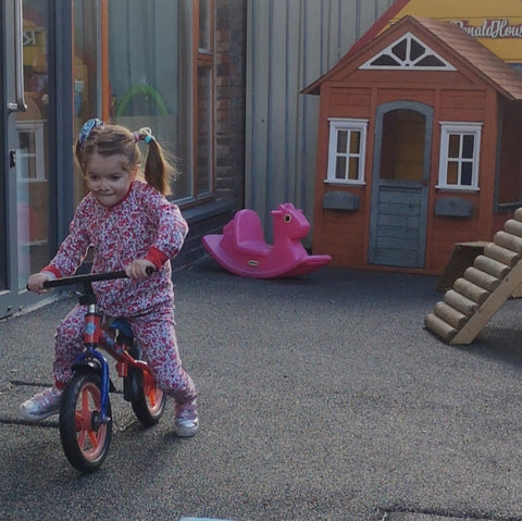 Poppy on a bike