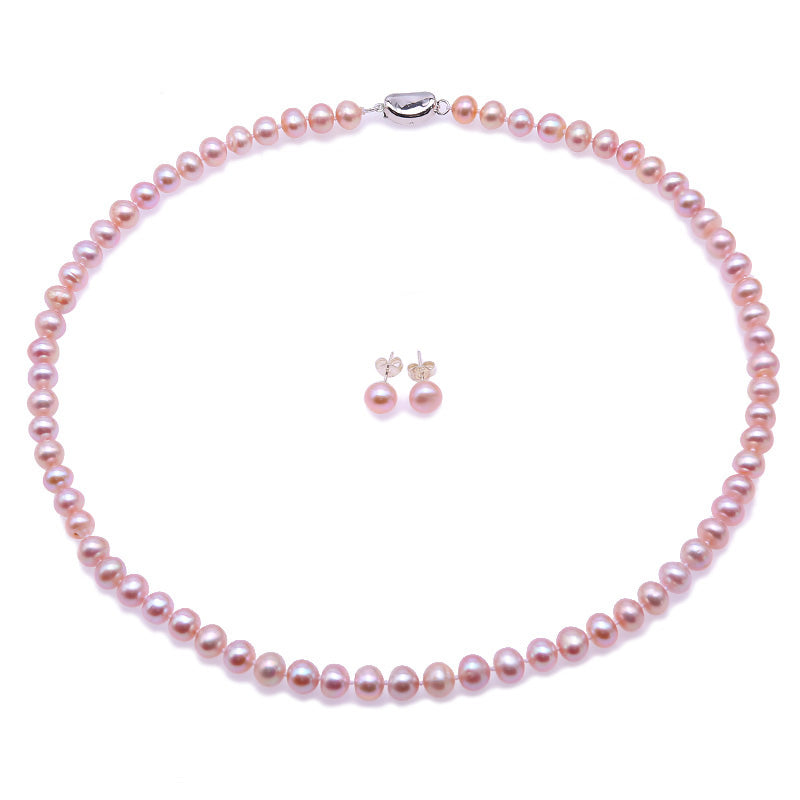 pink pearl bracelet and earrings