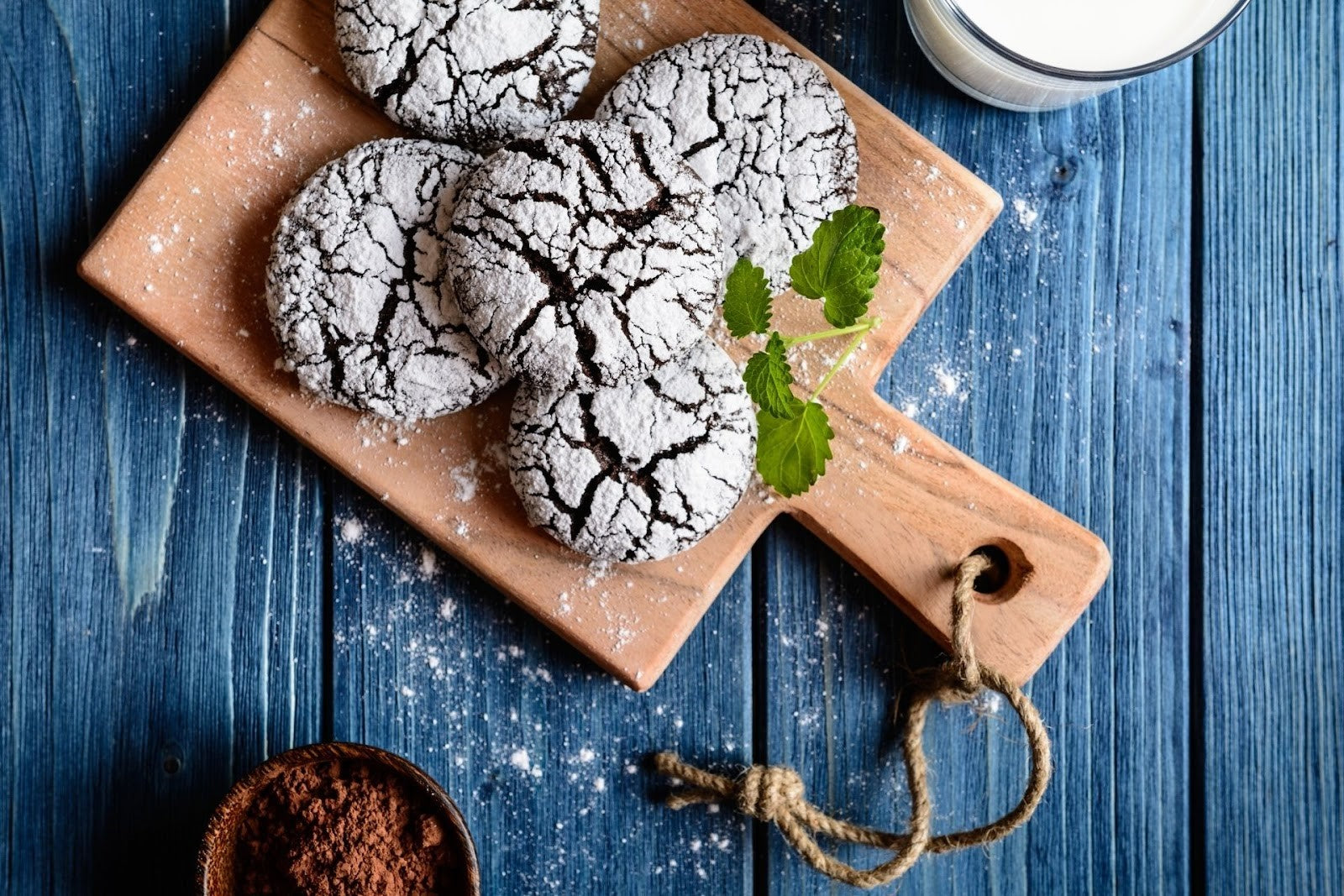 Chocolate crinkle cookies on a blue wooden table