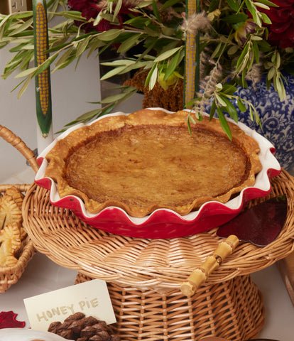 Honey pie for Rosh Hashanah in red ceramic pie pan