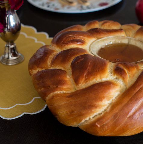 Round Challah with a Honey Bowl