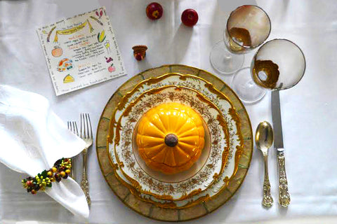 Gold and Orange Thanksgiving Table Setting with Pumpkin Bowl