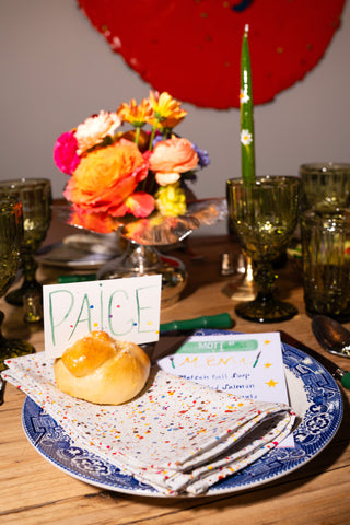 place setting with challah roll placecard holder
