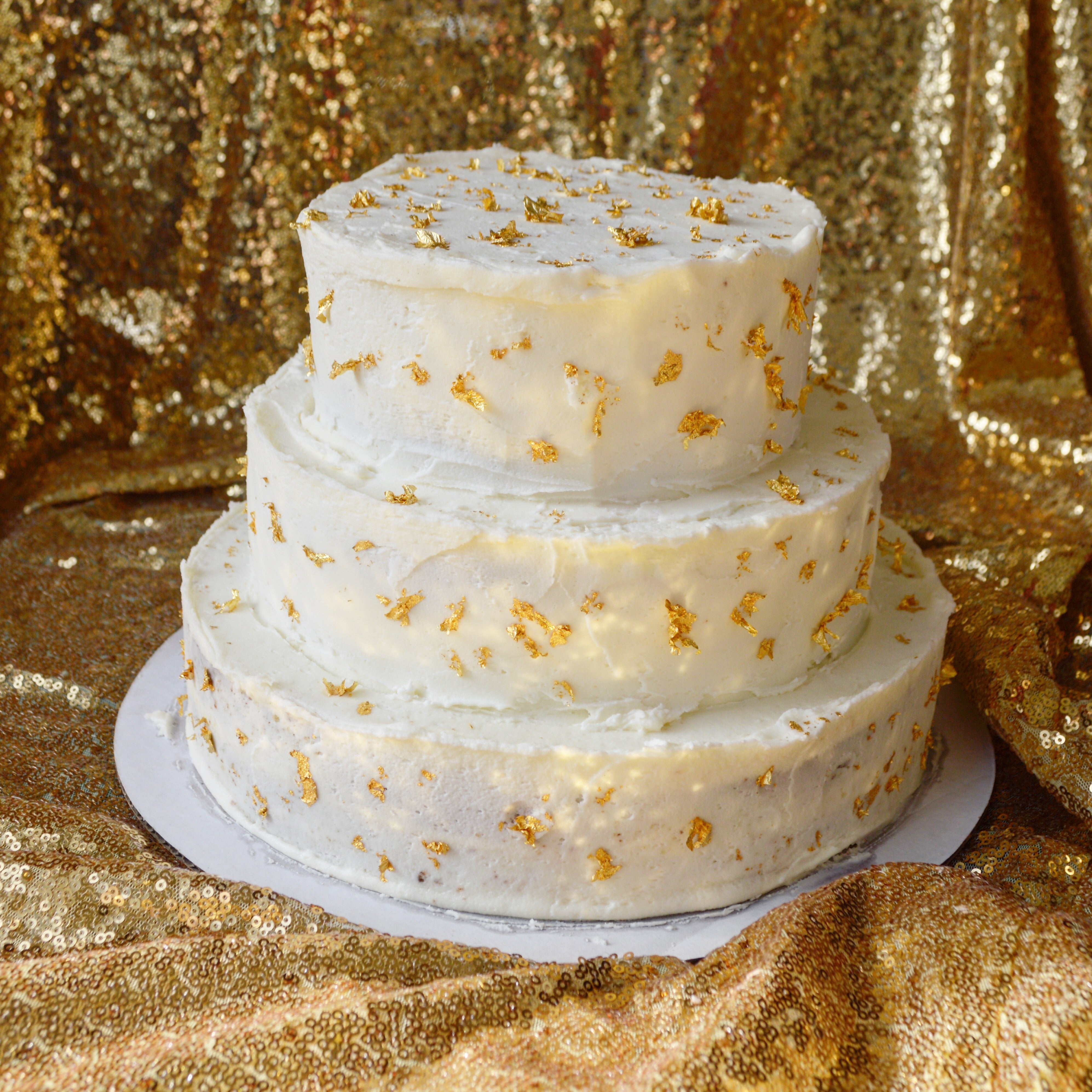 Chefanie tiered cake with gold leaf