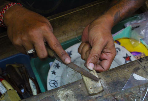 Our artisans creating our jewellery
