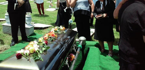 casket at catholic funeral