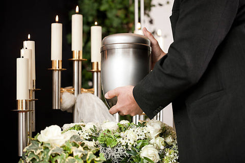 holding cremation urn