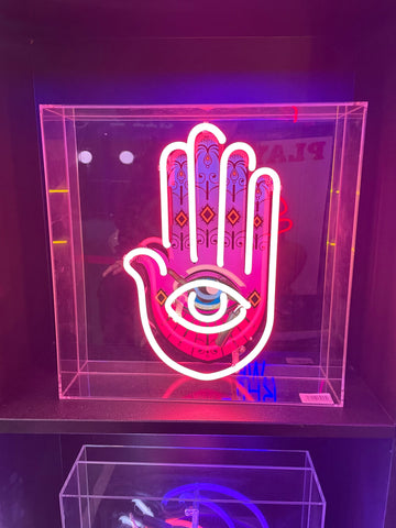Hand with eye on the center light
