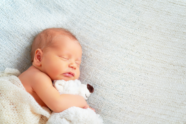 Baby with comfort toy