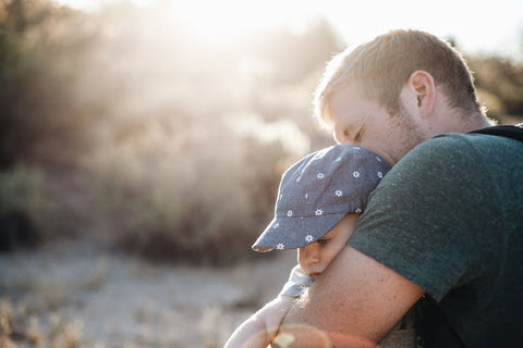 Dad Hugging Child