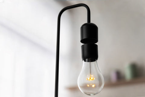 Modern lamp levitating light bulb