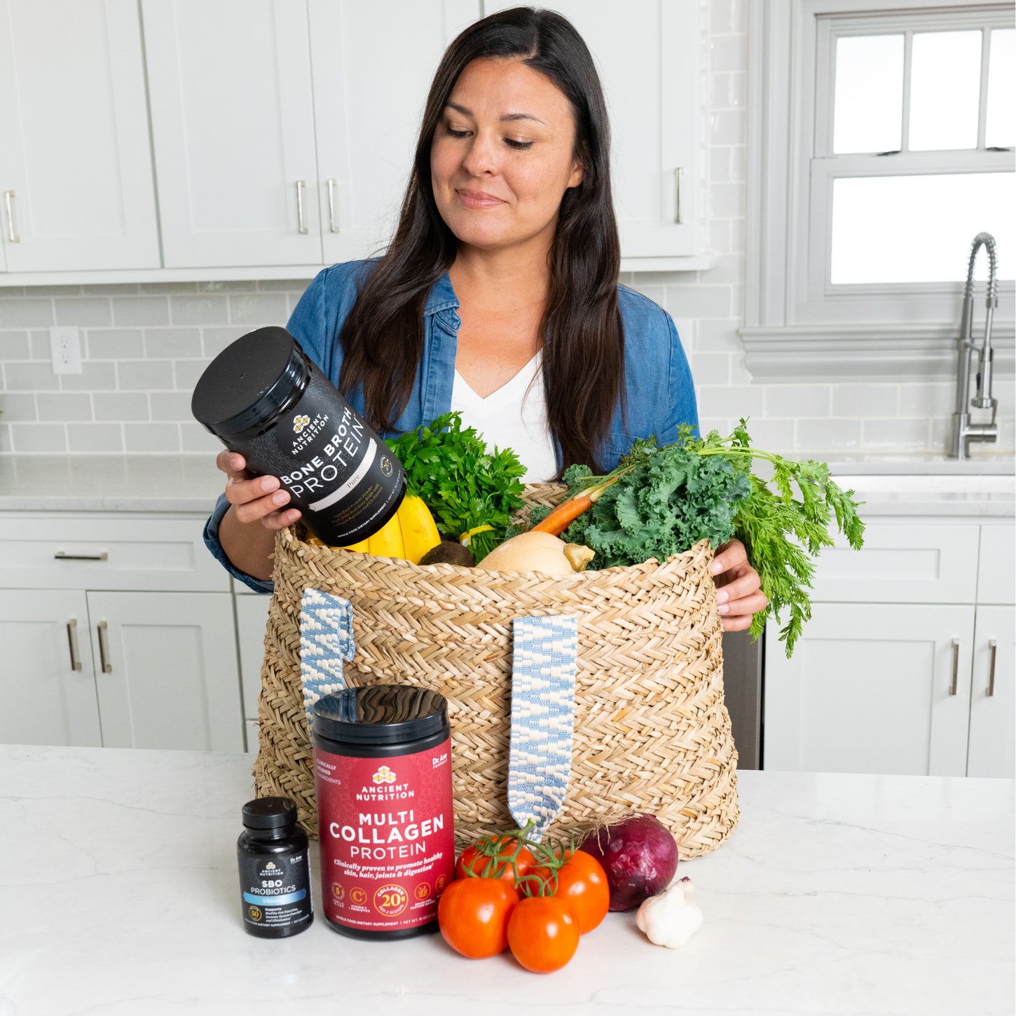 woman taking supplements out of a woven bag