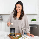 woman scooping bone broth protein butternut squash