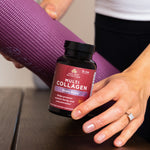 Multi collagen brain boost capsules next to yoga mat