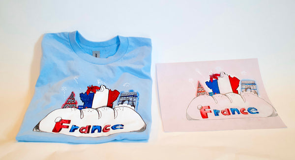 A blue screen printed shirt with artwork created from hand drawn artwork of a child.