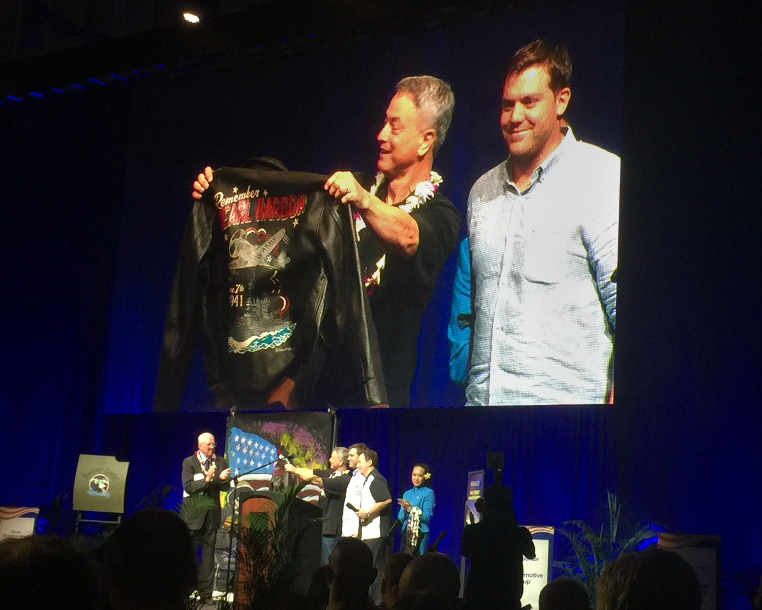 Mike Kennedy, a partner at Cockpit USA, presents Gary Sinise with one of our limited edition hand painted Remember Pearl Harbor A-2s.