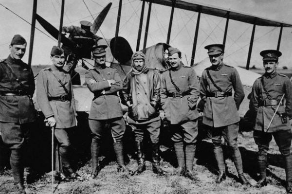 Montrose-Royal-Flying-Corps-officers-and-an-airmen-background-from-No-2-Squadron-pose-in-front-of-a-BE-2-biplane WWI