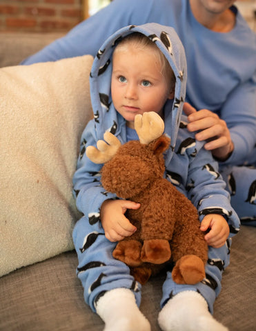 A cozy Leveret fleece robe on a young boy, showcasing the softness and comfort ideal for relaxed home settings