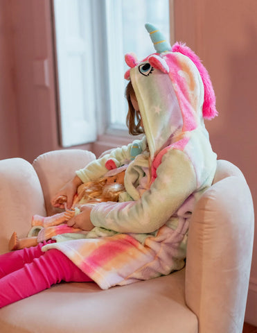 Child wrapped in a warm robe during winter