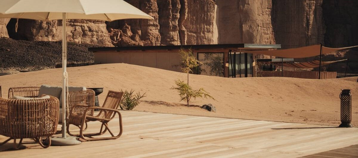 Cane-line Curve outdoor lounge chair and Nest lounge chair in the desert of AlUla region