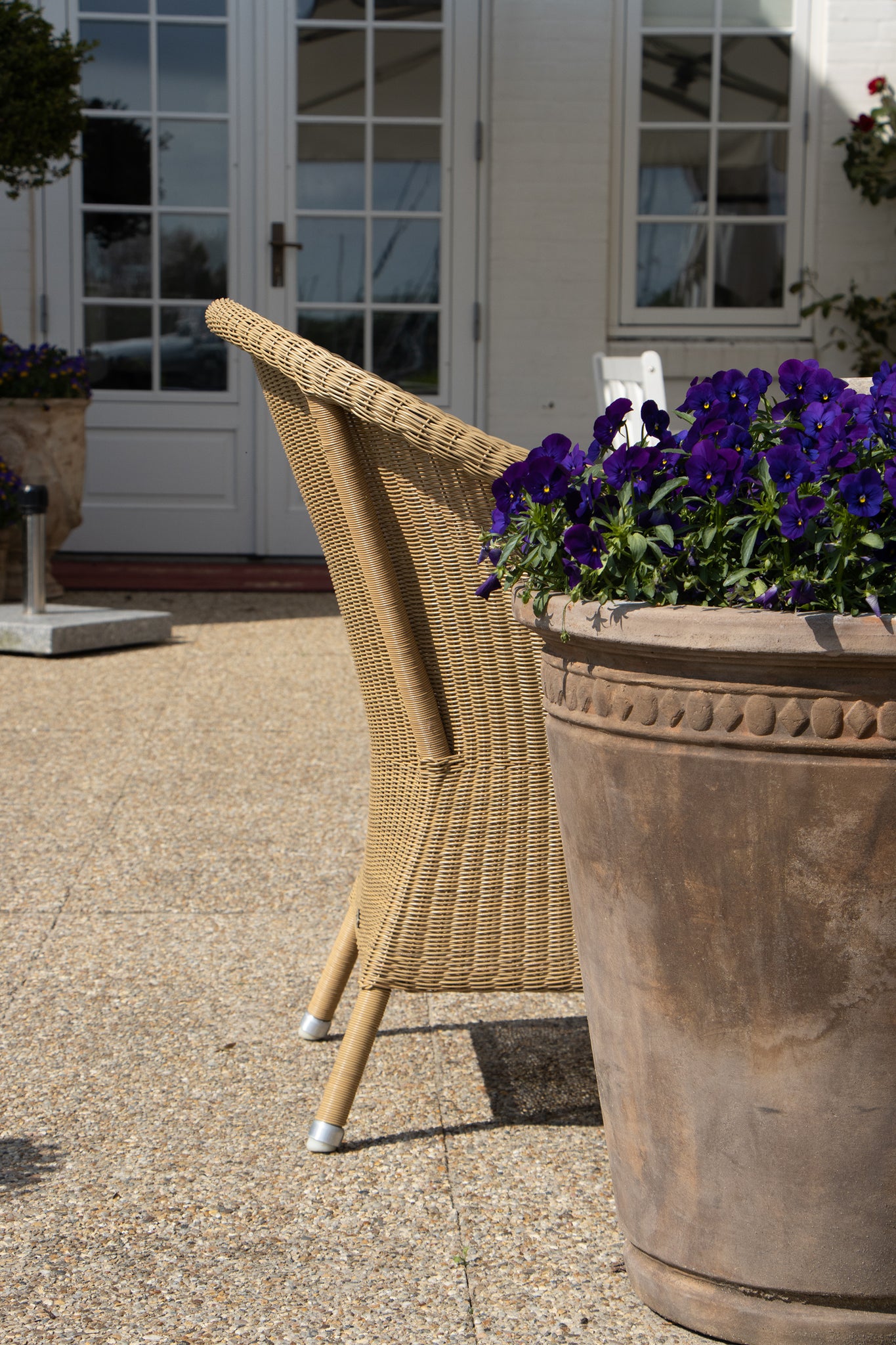 Close up of the nature Derby Chair with classic wicker pattern