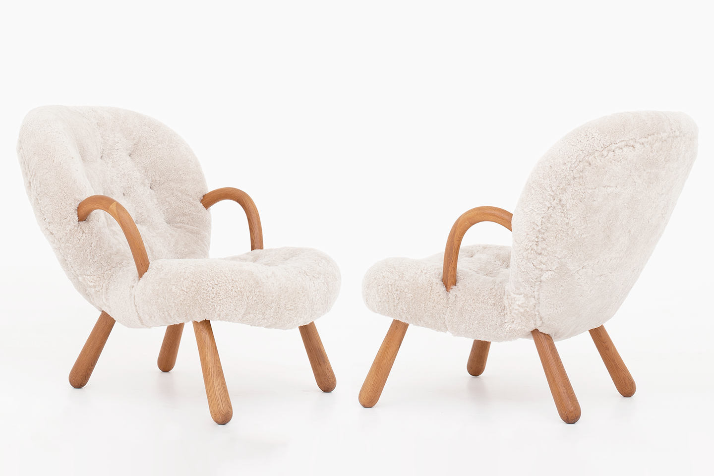 Clam Chairs by Arnold Madsen, lambskin