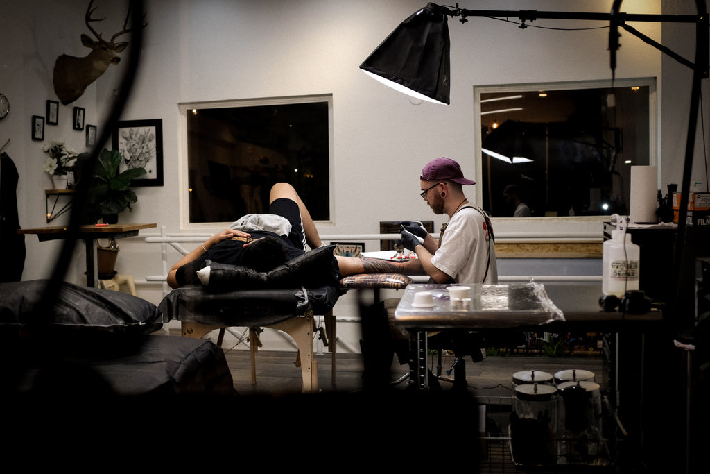 Kiwi Burt tattooing inn las vegas at hideout tattoo