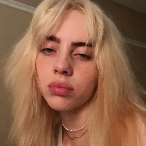 BILLIE EILISH wearing "Delicate but Strong Necklace"