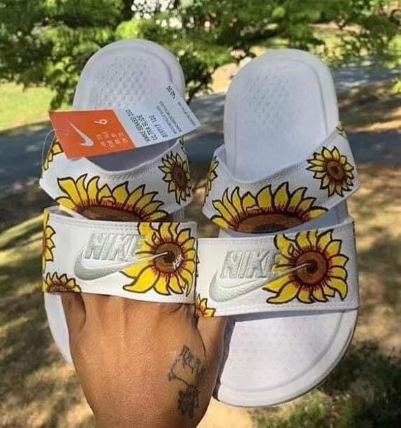 nike sunflower flip flops