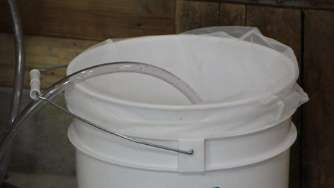 Fermentation Bucket with Cheesecloth