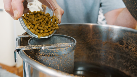 adding hops to hop basket