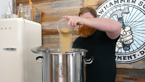 adding sugar to boil