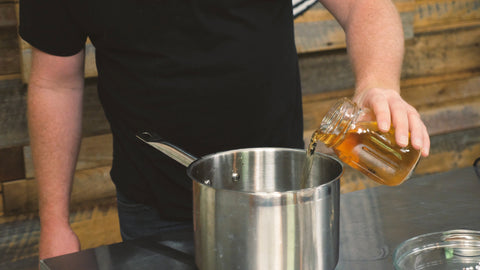 Decanting jar of washed yeast