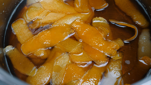 orange peels in simple syrup