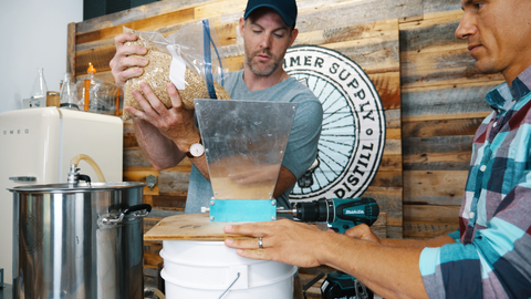 pouring grain into mill