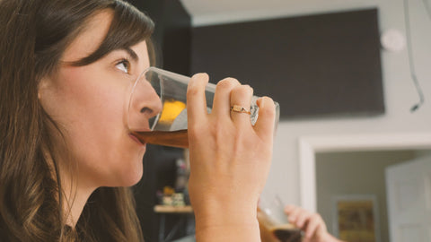 Rachael drinking extract brown ale