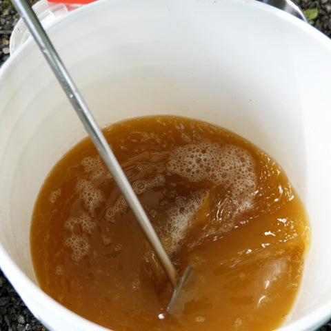 stirring cider & honey together