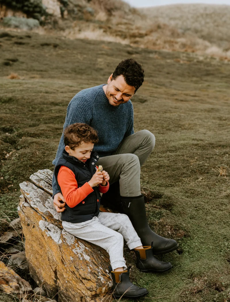 father and son in the forest