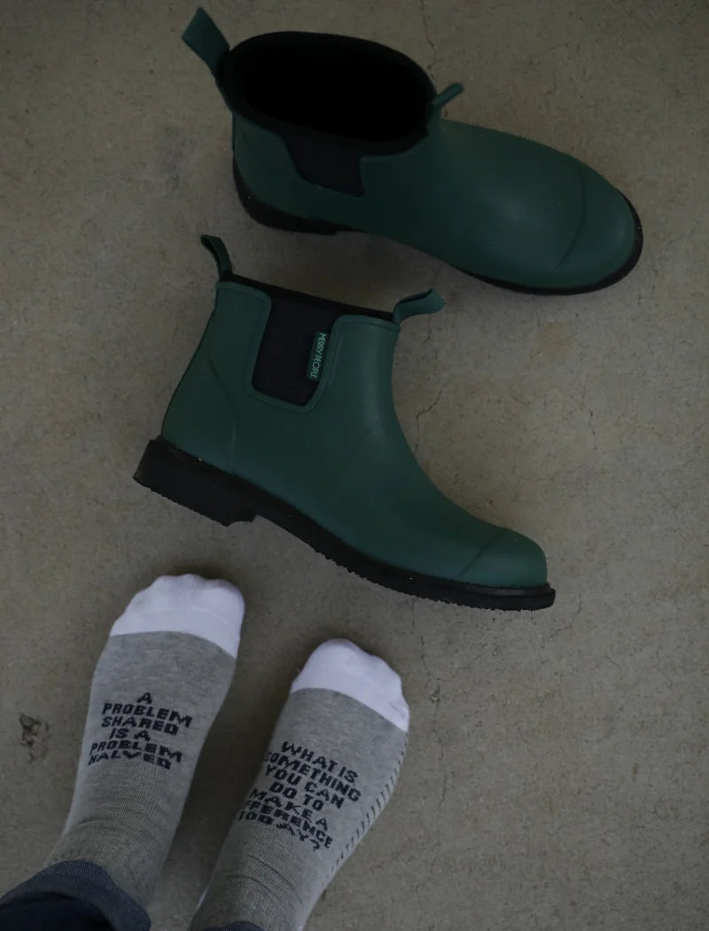 green boots and grey socks