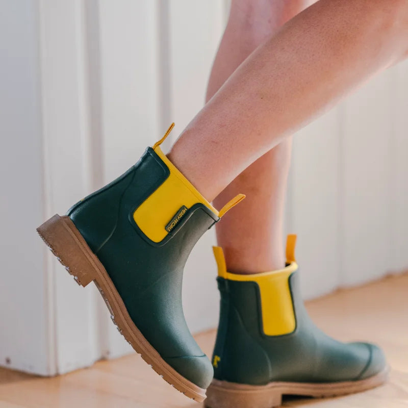 green boots in a house