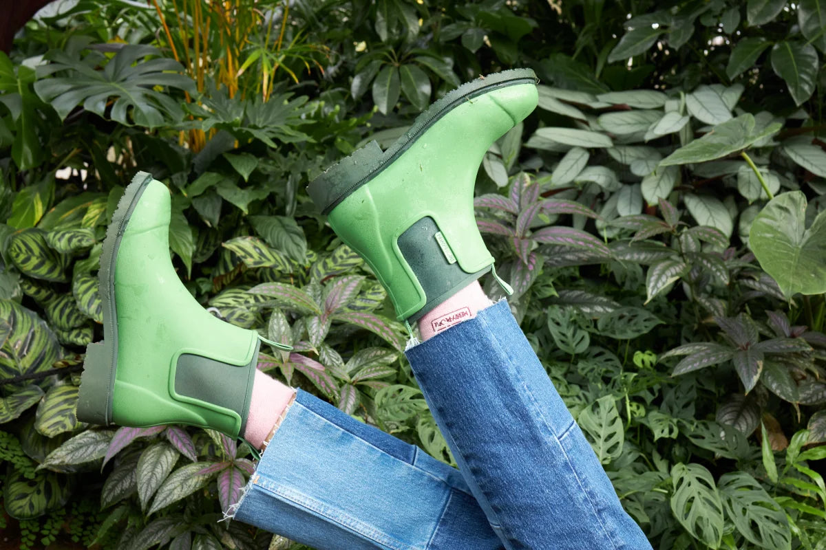 green boots on jeans in the jungle