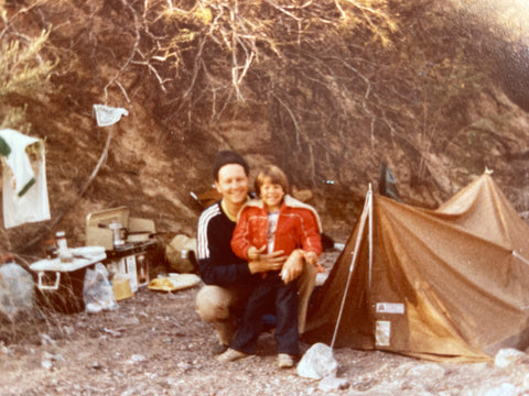 Father and son canoe up the Colorado River trip, camping along the way.