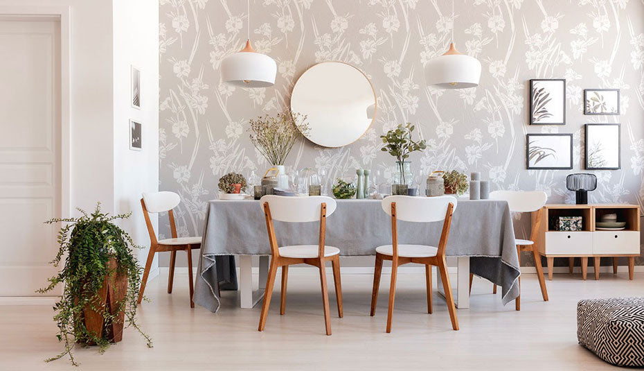 Dining room with grey floral peel and stick wallpaper.