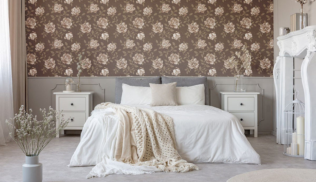 A bedroom featuring a brown floral accent wall