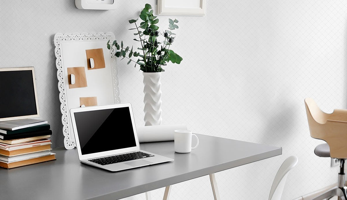 A white and metallic themed minimalistic home office